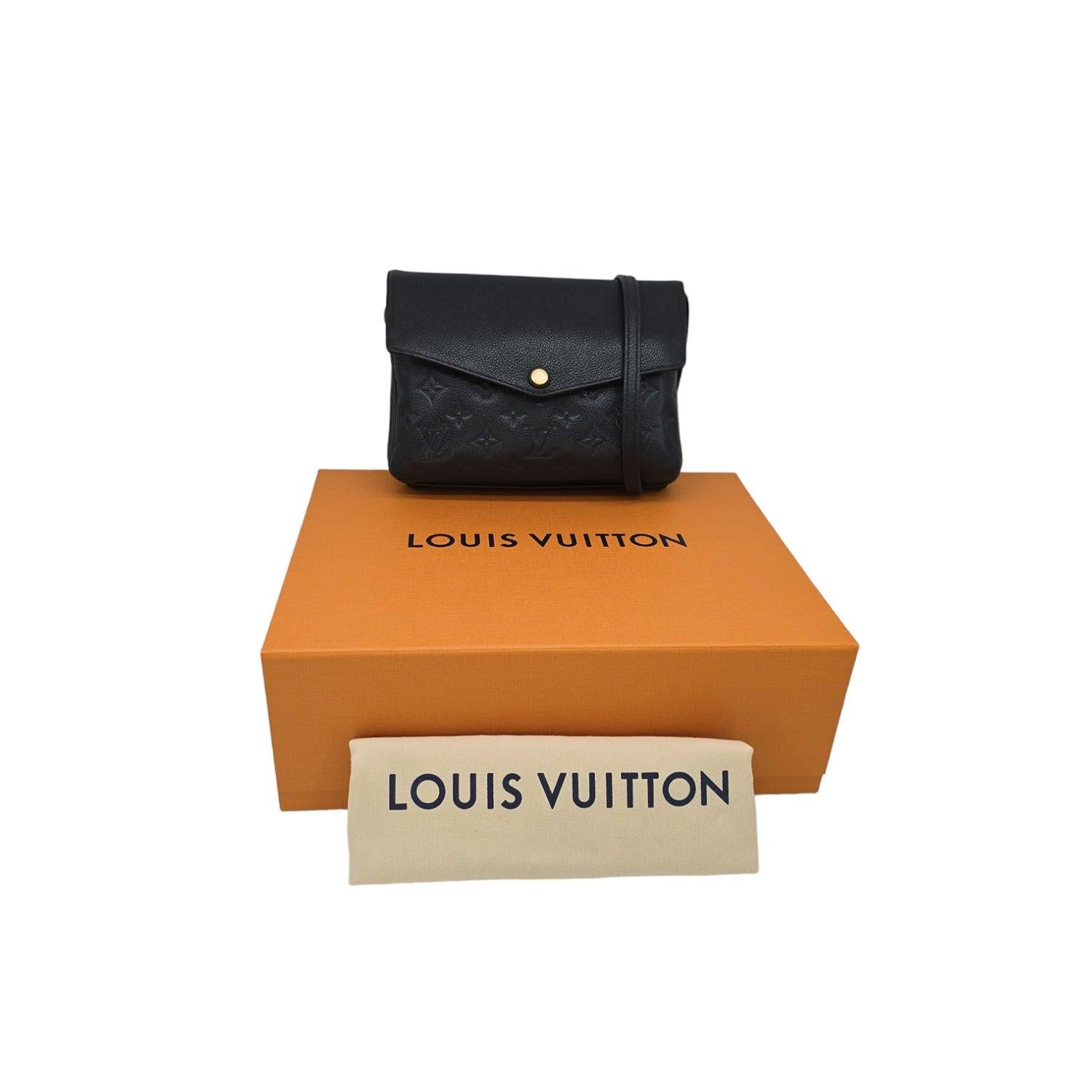 The Louis Vuitton Twice Black Monogram Empreinte Crossbody Bag is a luxurious and versatile accessory, perfect for any occasion. The embossed Monogram pattern adds a touch of sophistication to the grained cowhide leather exterior. With a press snap