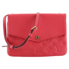 Louis Vuitton Twice Handtasche mit Monogramm aus Empreinte-Leder