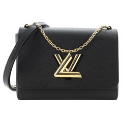 Louis Vuitton Twist and Twisty Handtasche Epi Leder MM