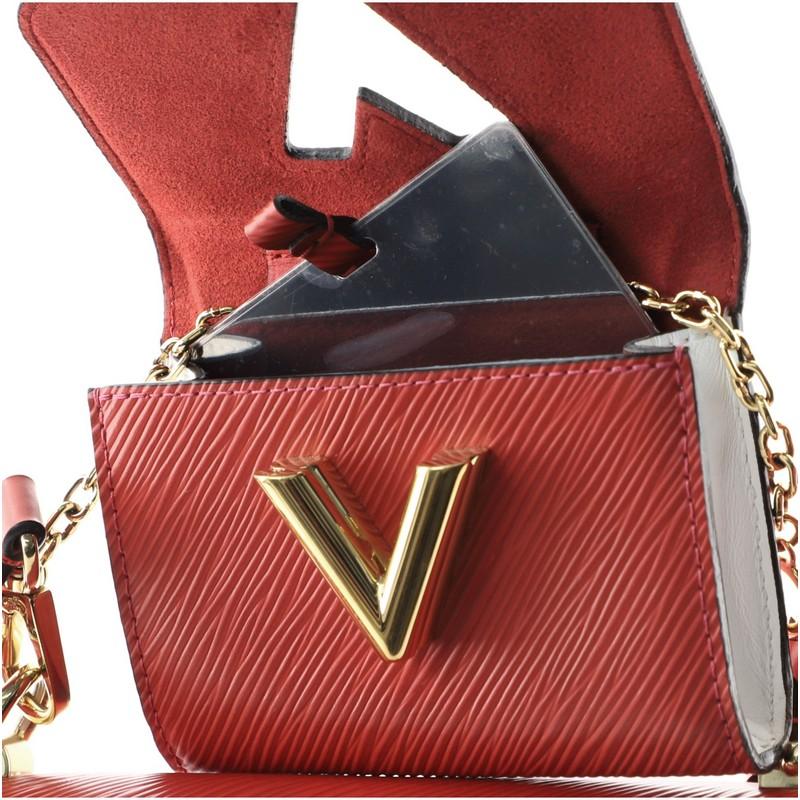 Louis Vuitton Twist and Twisty Handbag Epi Leather PM 1