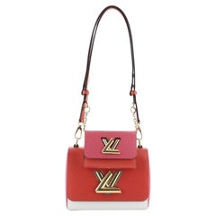 Louis Vuitton Twist and Twisty Handbag Epi Leather PM