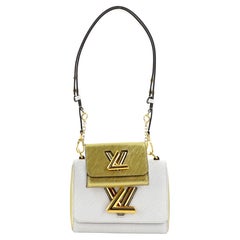 Louis Vuitton Twist and Twisty Handbag Epi Leather PM