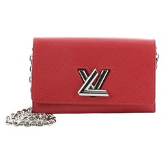 Louis Vuitton Twist Chain Wallet Epi Leather at 1stDibs  louis vuitton epi  twist chain wallet, lv twist wallet, lv twist chain wallet