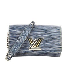 Louis Vuitton Twist Chain Wallet - For Sale on 1stDibs  lv twist belt  chain wallet, lv twist chain wallet, louis vuitton twist wallet on chain