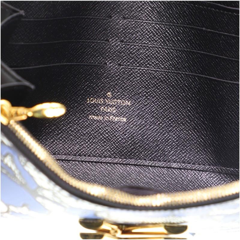 Louis Vuitton Twist Chain Wallet Limited Edition Lace Embossed Calfskin In Good Condition In NY, NY