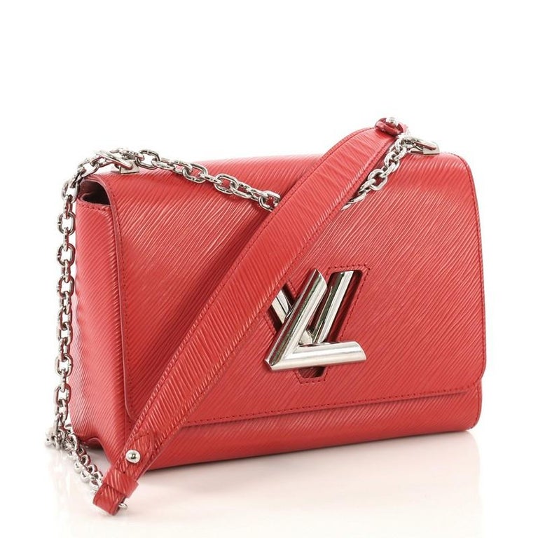 Louis Vuitton Twist Handbag Electric Epi Leather MM For Sale at 1stdibs