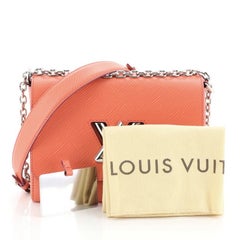 Louis Vuitton Twist Handbag Epi Leather MM