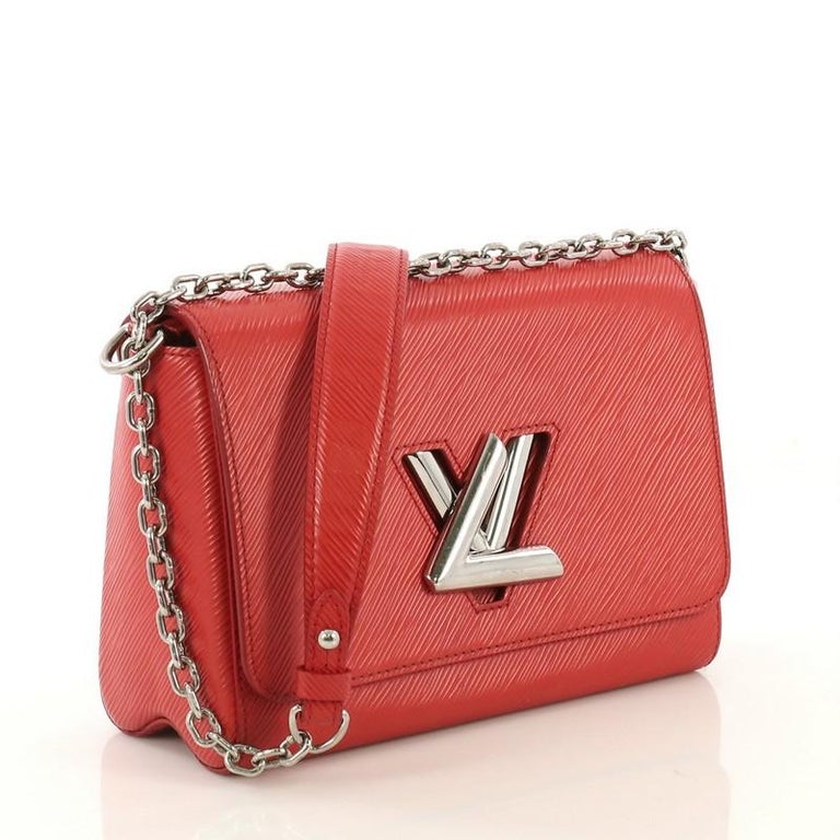 Louis Vuitton Twist Handbag Epi Leather MM at 1stDibs