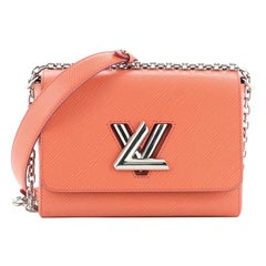 Louis Vuitton Twist Handbag Epi Leather MM