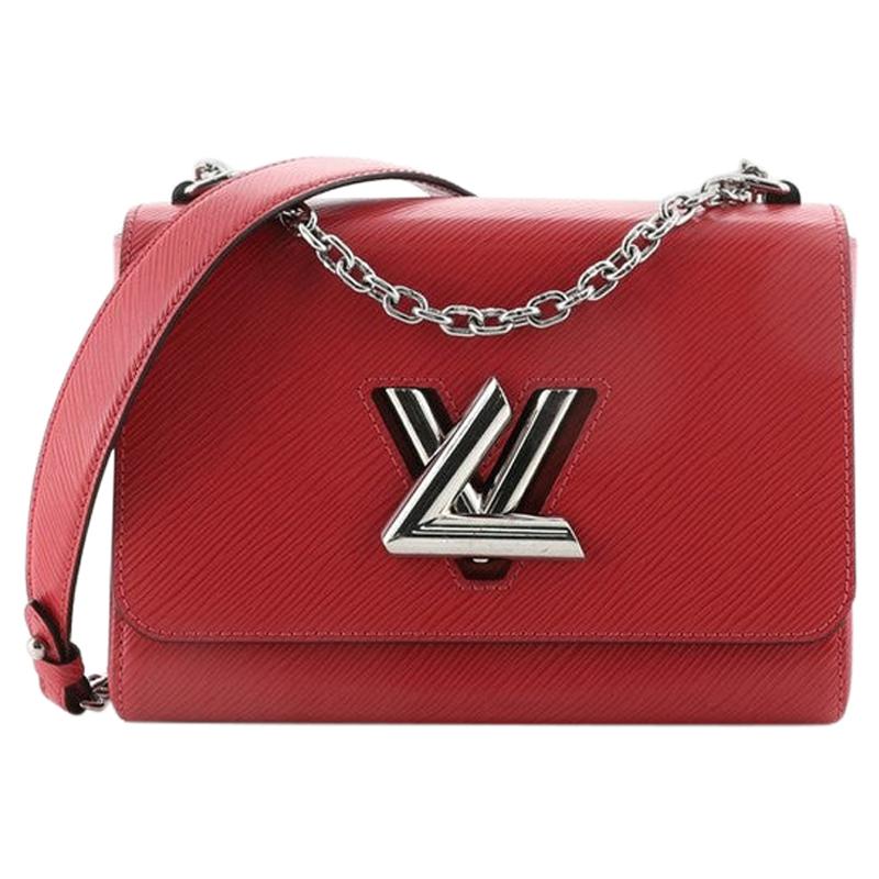 Louis Vuitton Twist Handbag Epi Leather MM