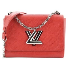Louis Vuitton Twist Handbag Epi Leather MM