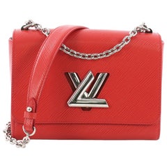 Louis Vuitton Twist Handbag Epi Leather MM