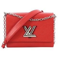 Louis Vuitton Twist Handbag Epi Leather MM