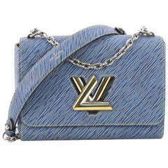 Louis Vuitton Twist Handbag Epi Leather MM
