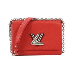 Louis Vuitton Twist Handbag Epi Leather MM