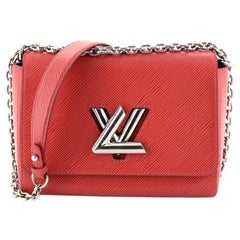 Louis Vuitton Twist Handbag Epi Leather MM