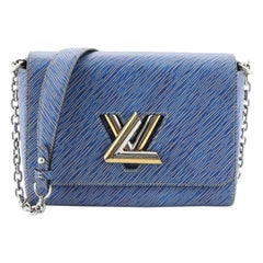 Louis Vuitton Twist Handbag Epi Leather MM