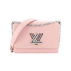 Louis Vuitton Pink Shearling Twist LV Gold Chain Bag 1LK0412C For Sale at  1stDibs