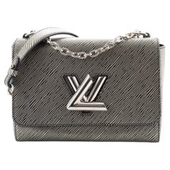 Louis Vuitton Aztec Epi Leather Twist MM Shoulder Bag (SHF-16794) – LuxeDH