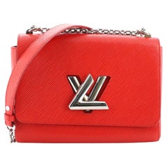 Louis Vuitton Twist Handbag Epi Leather MM