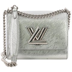 Louis Vuitton Twist Handbag Epi Leather PM
