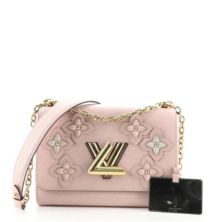 Louis Vuitton on X: Find the Perfect Gift with #LouisVuitton. A new Twist  bag boasts extra sparkle with a crystal-embellished chain strap. Explore a  selection of #LVGifts both classic and new, iconic