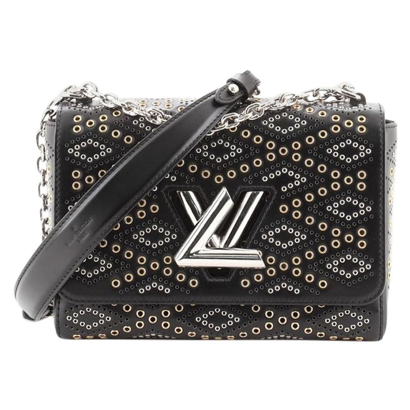 Louis Vuitton Twist Handbag Limited Edition Grommet Embellished Leather M