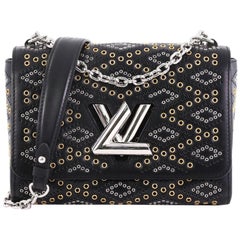 Louis Vuitton Twist Handbag Limited Edition Grommet Embellished Leather MM
