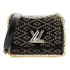 Louis Vuitton Twist Handbag Limited Edition Grommet Embellished Leather MM