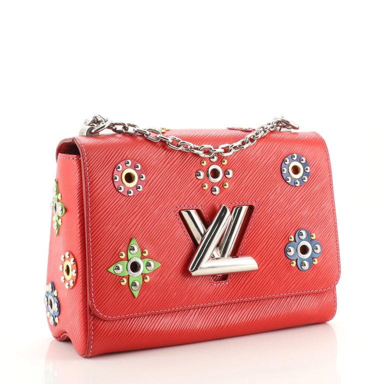 Louis Vuitton EPI Chain Flower Print Twist MM Cross-body Bag at 1stDibs