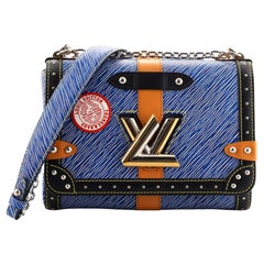 Louis Vuitton Twist Handbag Limited Edition Grommet Embellished Leather MM  at 1stDibs