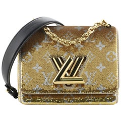 Louis Vuitton Twist Handtasche mit Monogramm und Pailletten PM