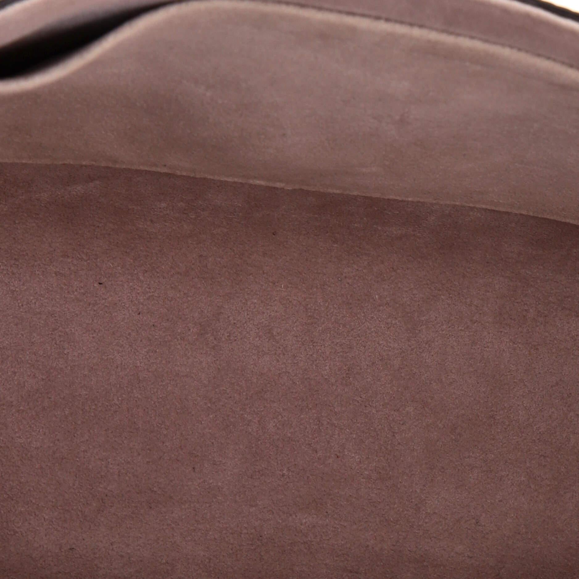 Sac à main Louis Vuitton Twist en cuir épi clouté MM 1