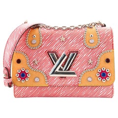 Sac à main Louis Vuitton Twist en cuir épi clouté MM