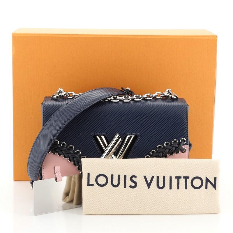 This Louis Vuitton Twist Handbag Whipstitch Epi Leather MM, crafted from blue and pink whipstitch epi leather, features a chain link strap with leather pad, frontal flap, and silver-tone hardware. Its LV twist lock closure opens to a blue microfiber