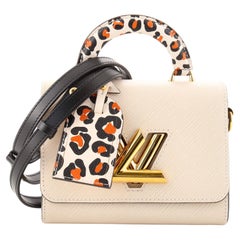 Louis Vuitton Twist Leopard Print Top Handle Bag Epi Leather PM