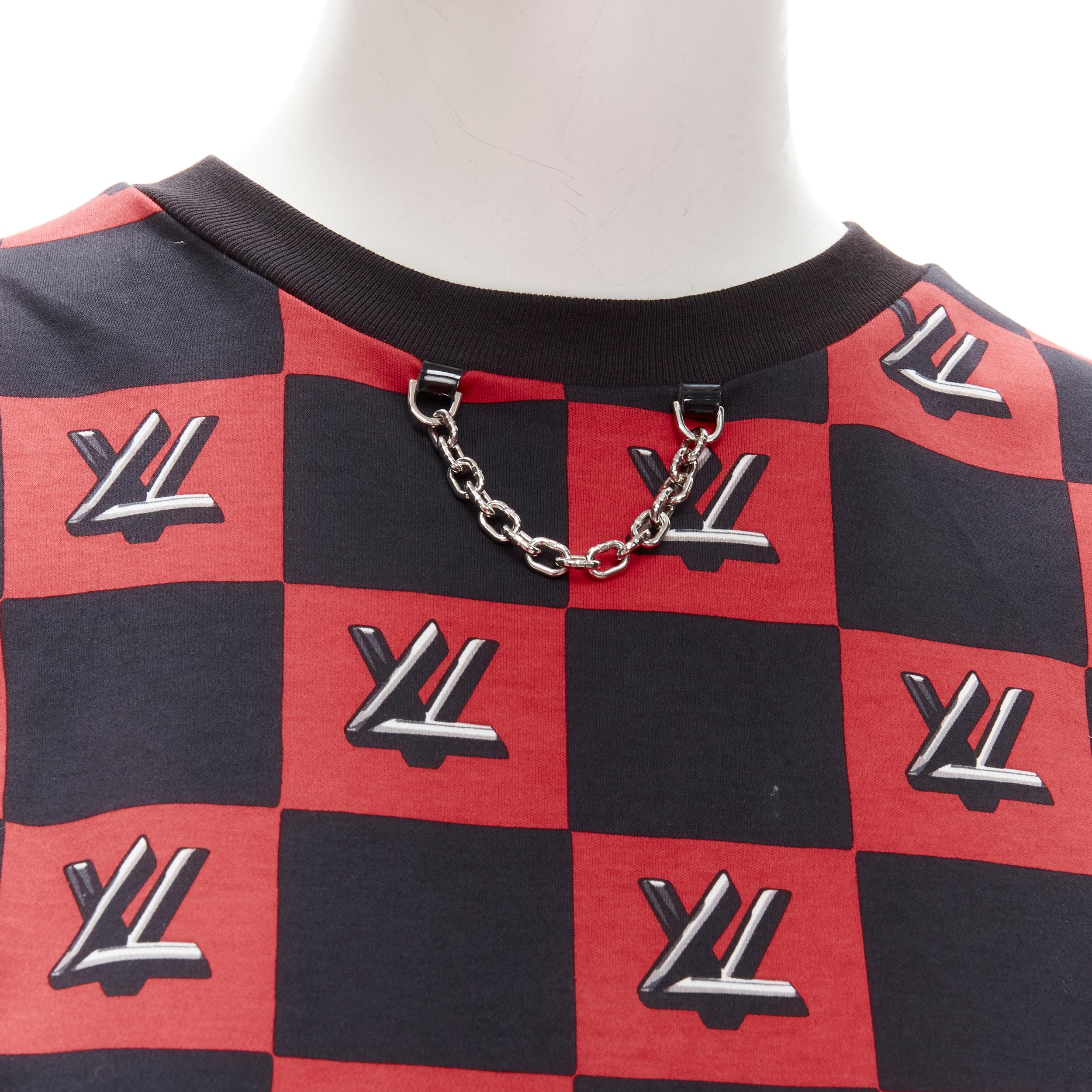 LOUIS VUITTON Twist Lock LV red black Damier check flutter sleeve vest 
Reference: ANWU/A00487 
Brand: Louis Vuitton 
Collection: Twist Lock 
Material: Cotton 
Color: Red 
Pattern: Checked 
Extra Detail: Silver chain trim at collar. 


CONDITION: