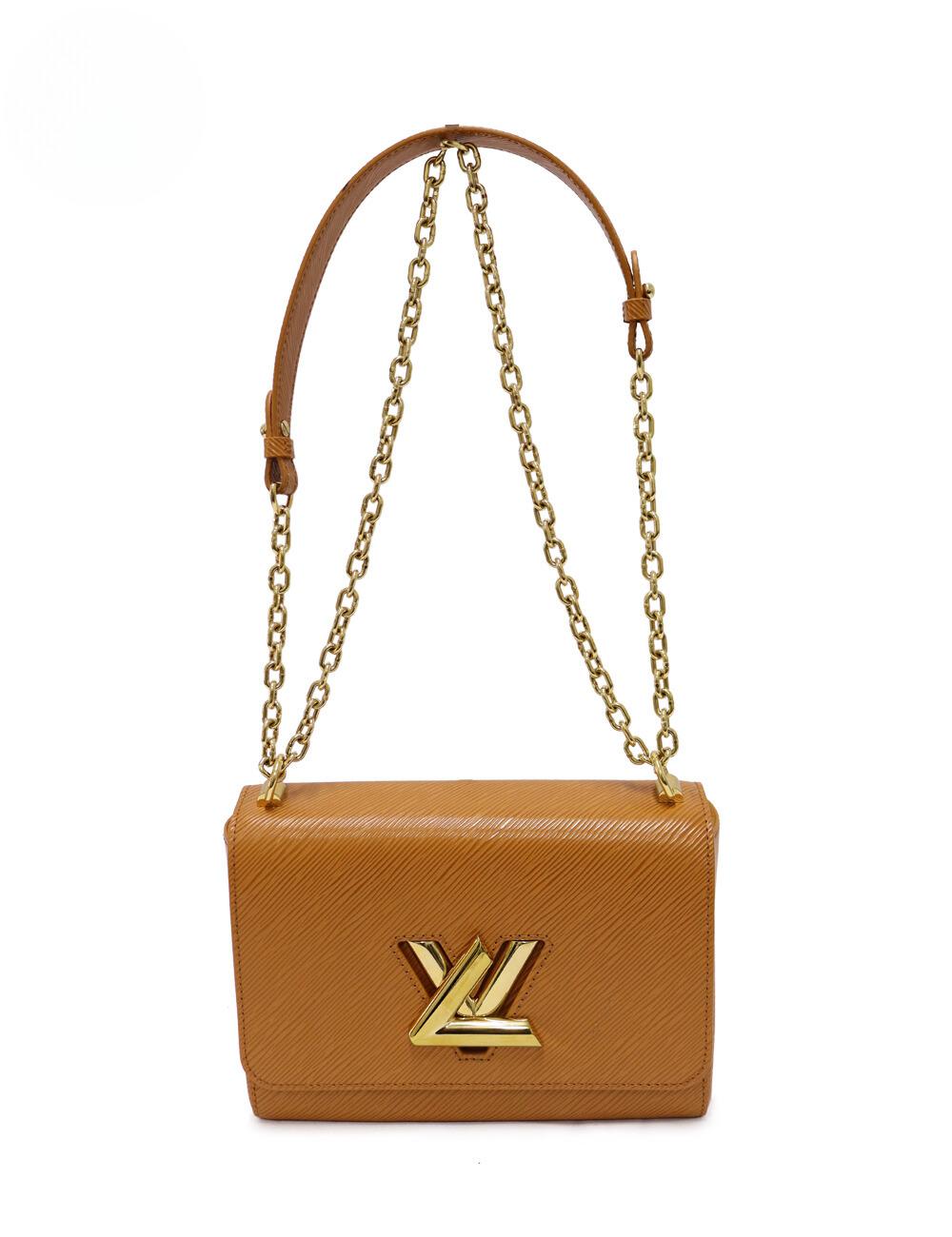 Louis Vuitton Twist Lock MM Epi Leather Chain Bag, Features Two Interior flat pockets one with removable mirror.

Material: Leather
Hardware: Gold
Height: 23cm
Width: 17cm
Depth: 9cm
Chain Drop: 30cm
Overall condition: Excellent
Interior condition: