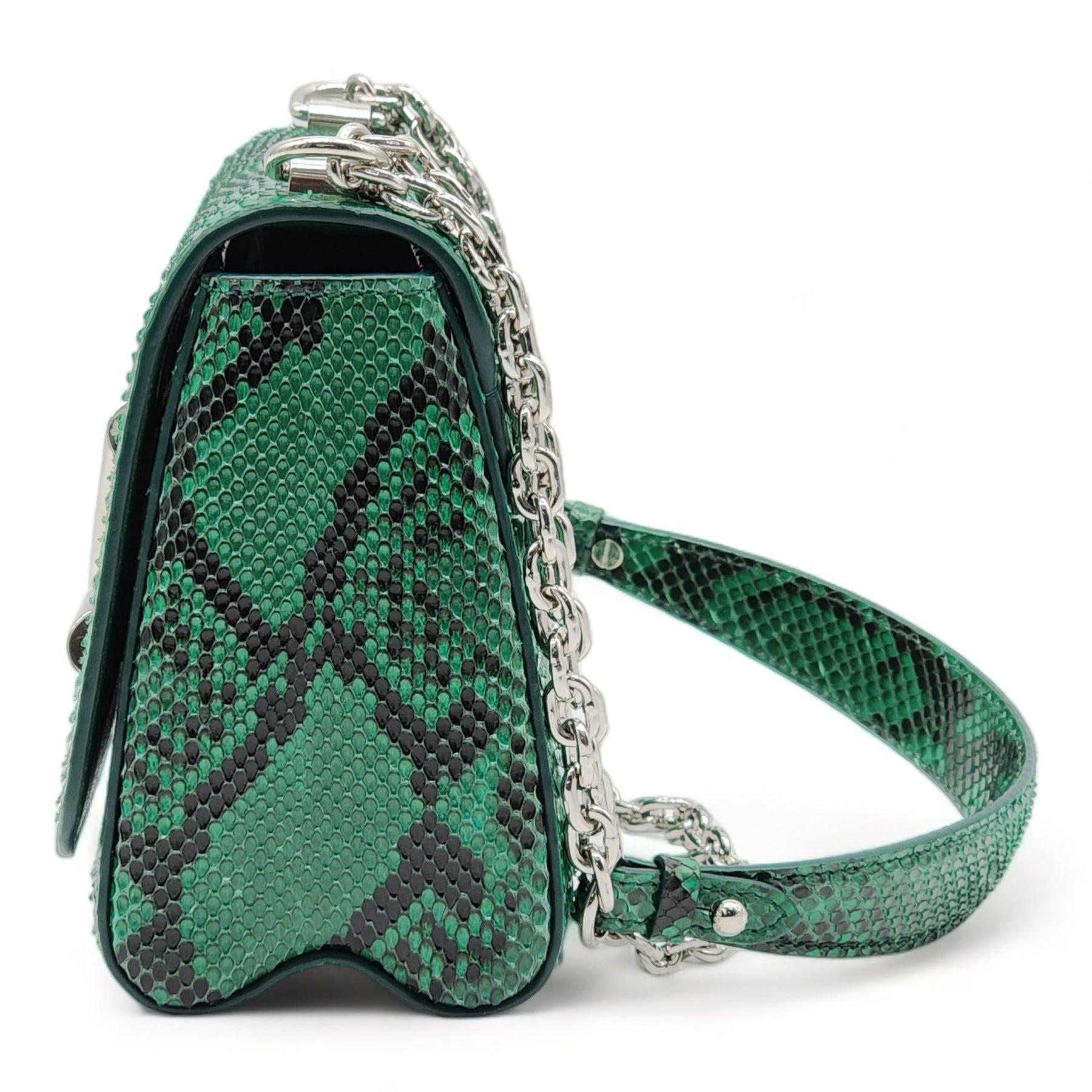 Louis Vuitton Twist MM Green Python.

Additional information:
Material: Python Skin
Color: Green
Cowhide leather trim
Smooth cowhide leather lining
Silver-color hardware
Transforming signature LV Twist lock
1 interior flat back pocket​
1 interior