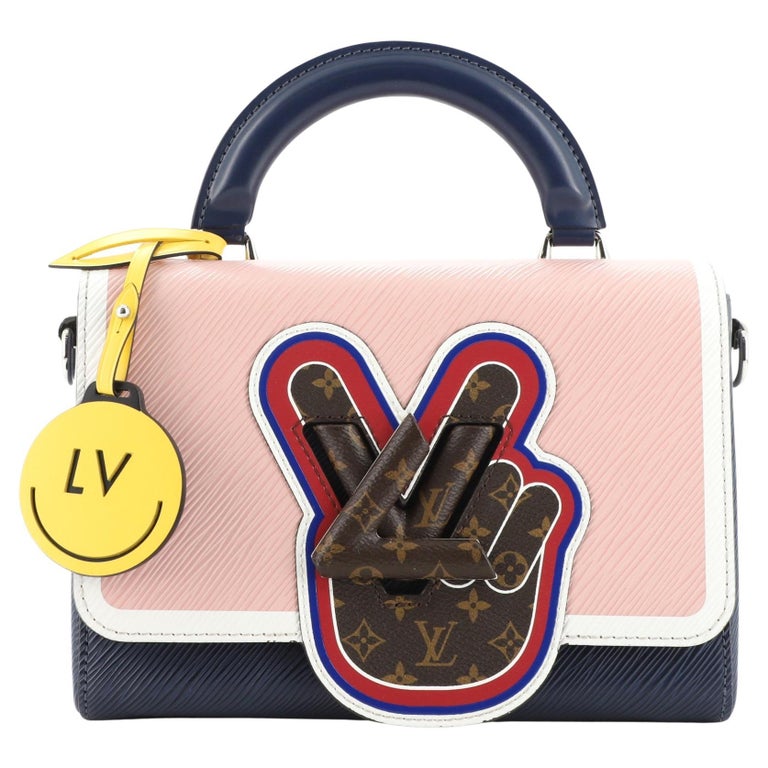 Louis Vuitton Twist Top Handle Bag Limited Edition Peace Love Epi and Mon  at 1stDibs