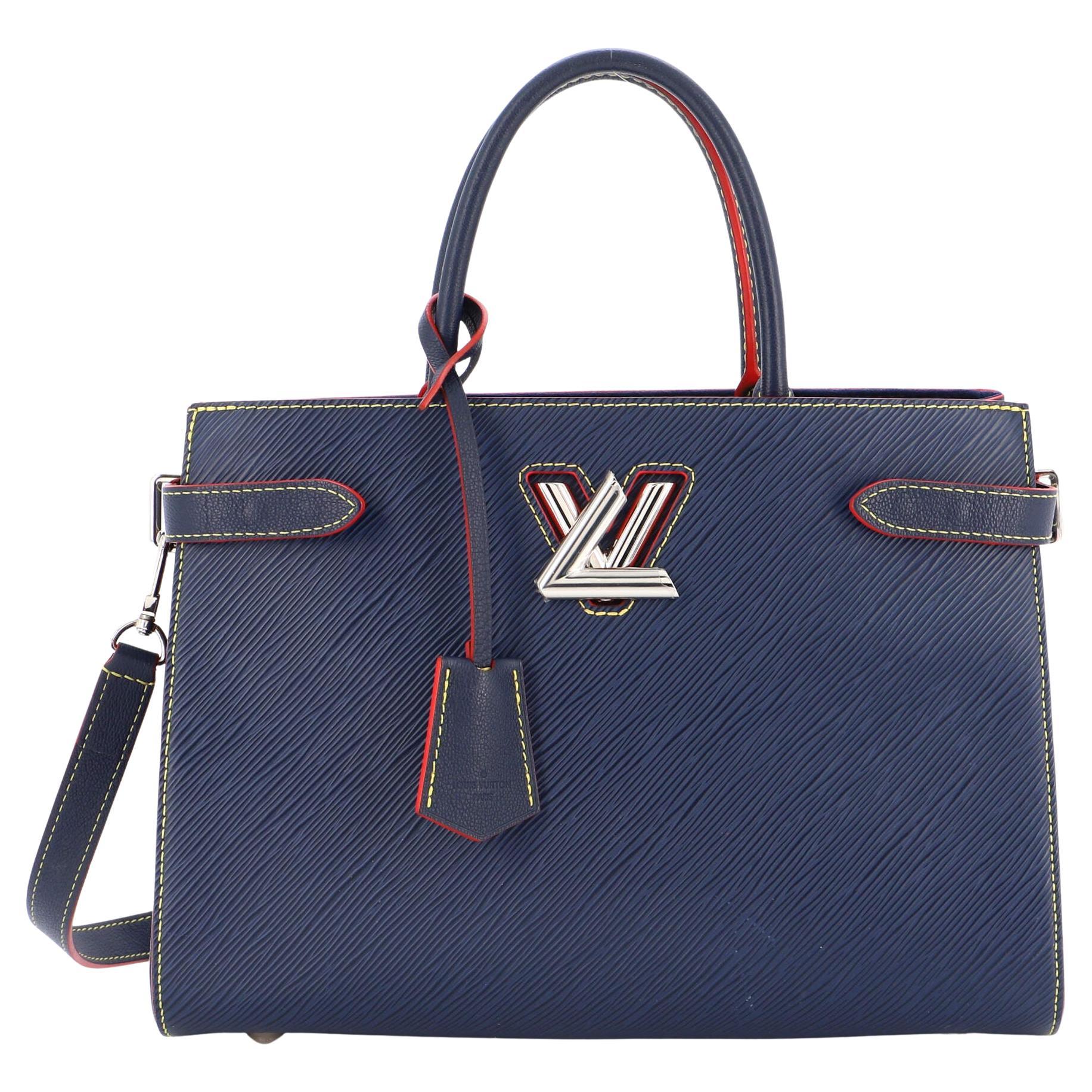 Louis Vuitton Gold Epi Leather Twist PM Bag at 1stDibs  louis vuitton gold  handbag, lv gold purse, gold louis vuitton purse