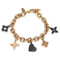 Louis Vuitton Charm Bracelets - 15 For Sale at 1stDibs  louis vuitton  charms for bracelets, louis vuitton bracelet charm, louis vuitton charm  bracelet gold