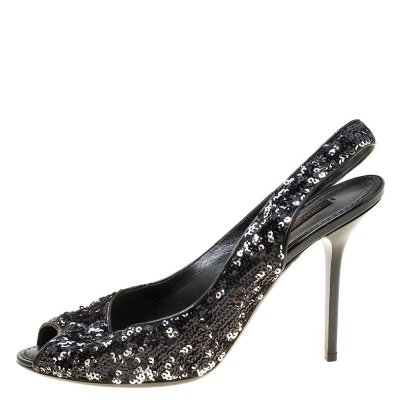 You're all set to sparkle and shimmer in these gorgeous sandals from Louis Vuitton! They are crafted from two-tone sequins and feature an open toe silhouette. They flaunt slingbacks and come equipped with comfortable leather lined insoles and 10.5