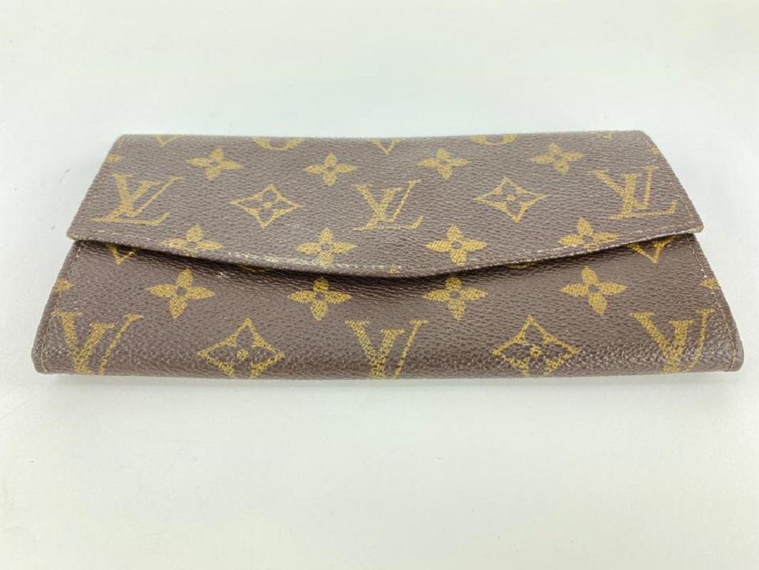 Louis Vuitton Ultra Rare Vintage Monogram Sarah Wallet Flap Porte Tresor In Good Condition For Sale In Dix hills, NY