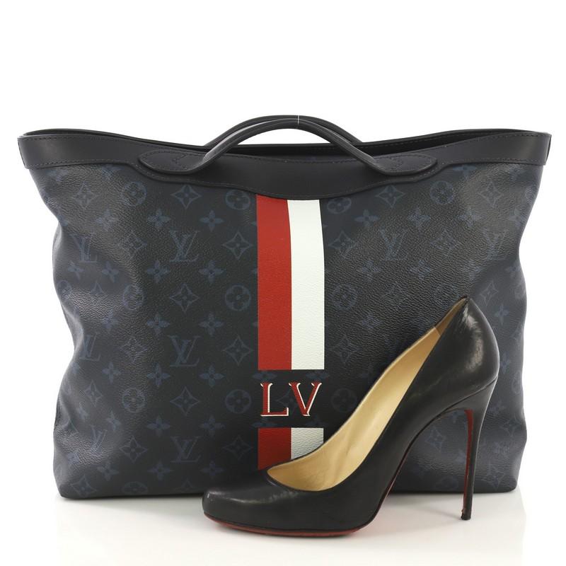This Louis Vuitton Ultralight Tote Monogram Cobalt Canvas, crafted from navy monogram cobalt coated canvas, features short top handles, dual nylon shoulder straps, white and red stripe with 