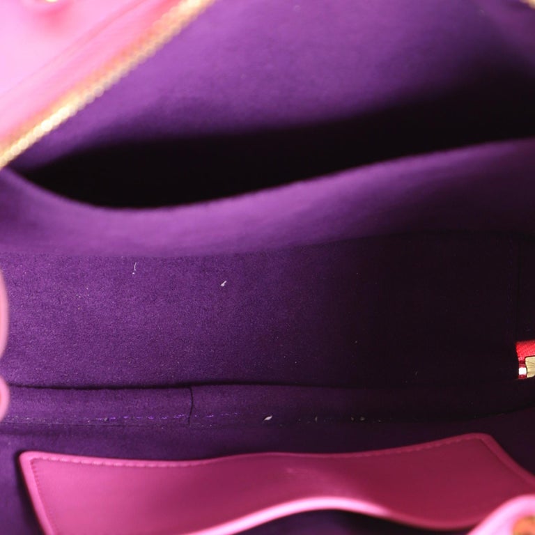 Louis Vuitton, Bags, Louis Vuitton Utility Crossbody Bag Calfskin With  Embossed Monogram Detail Pink