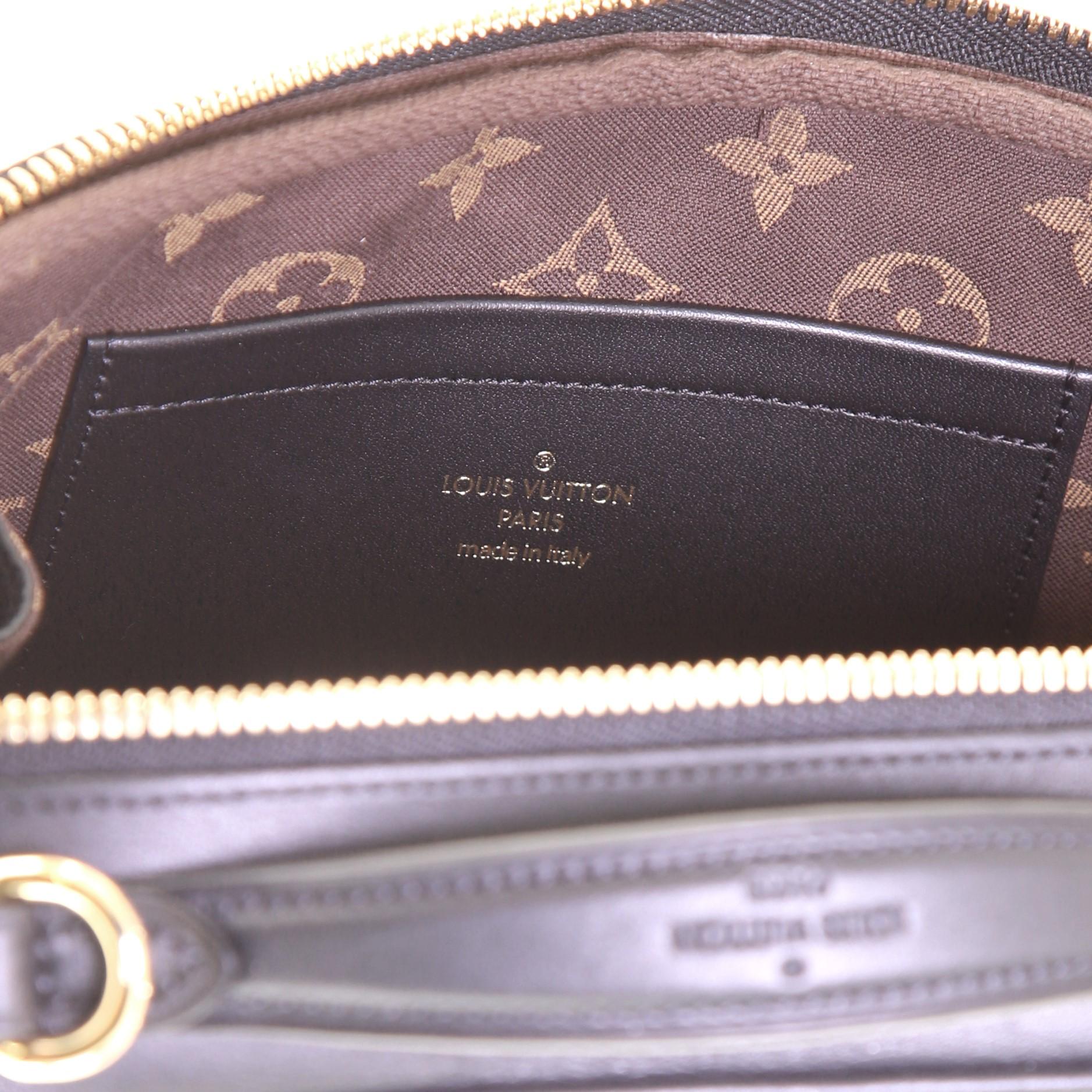 Louis Vuitton Utility Crossbody Bag Calfskin with Embossed Monogram Detail In Good Condition In NY, NY