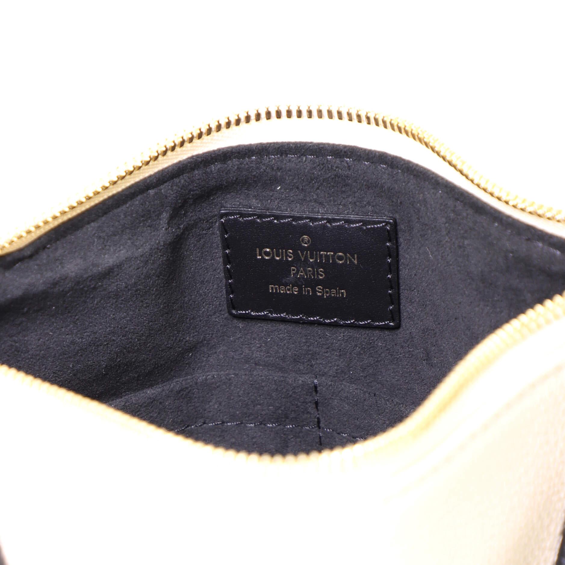 Louis Vuitton V Tote Monogram Empreinte Leather BB 1