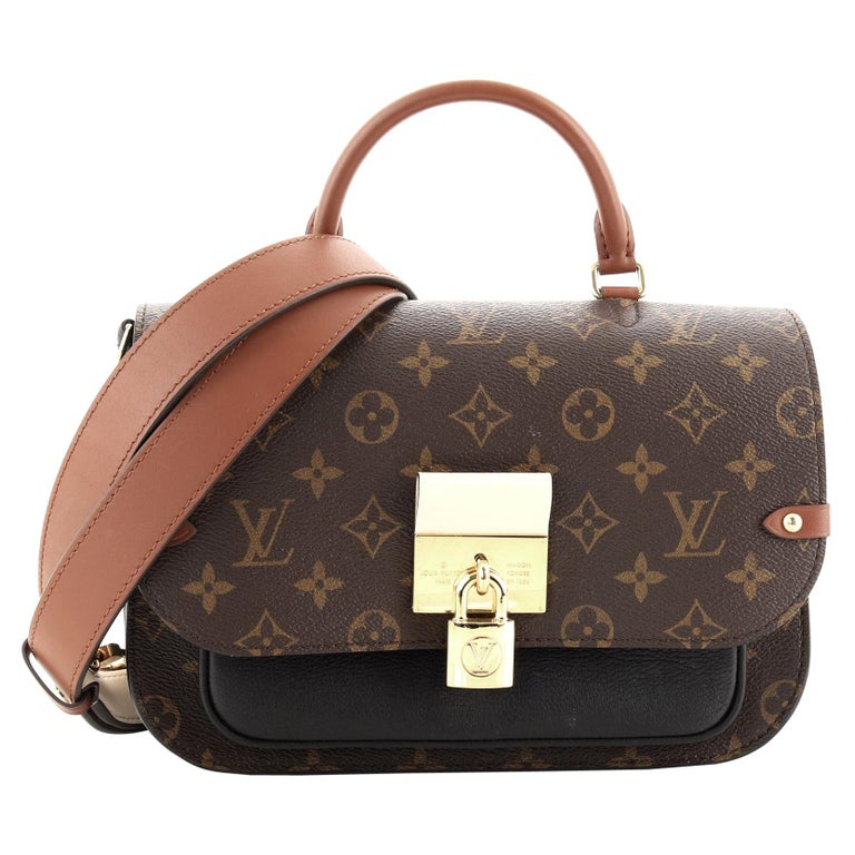 Louis Vuitton, Large bag in monogrammed canvas and leather.