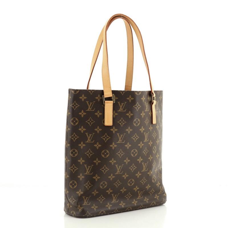 Condition: Very good. Creasing near base, minor darkening and watermarks on handles, scratches on hardware. 
Accessories: No Accessories 
Measurements: Handle Drop 8